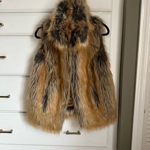Beautiful never worn Neimon Marcus faux fur vest.